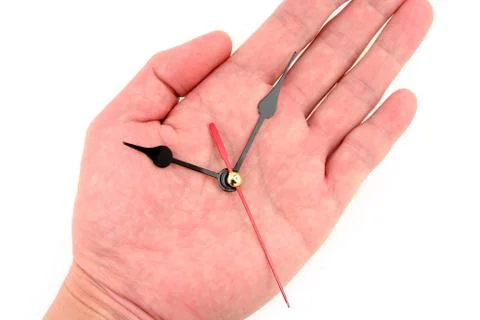 Hand and clockface Stock Photos