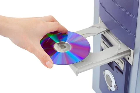 Hand and computer cd-rom Hand and computer cd-rom isolated on white backgr... Stock Photos
