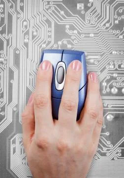 Hand and computer mouse on electronic background Stock Photos