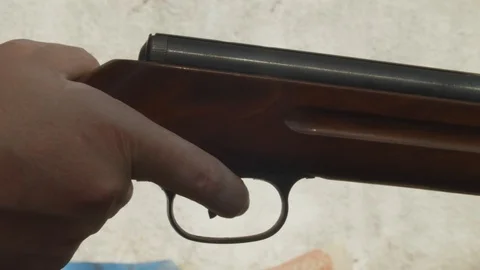 Hand and finger pulling trigger on gun stock footage 動画素材 116487697