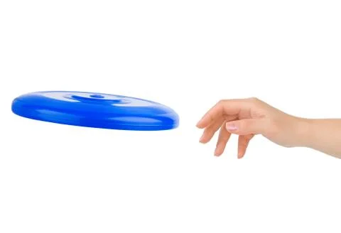 Hand and flying disc Foto stock