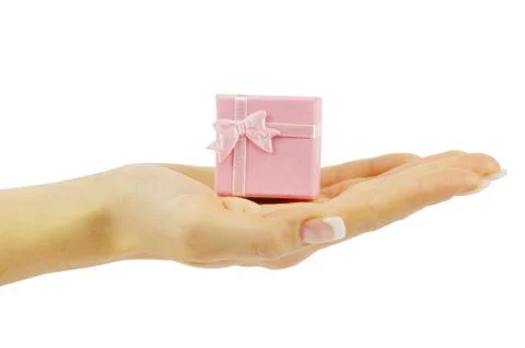 Hand and gift Stock-Fotos
