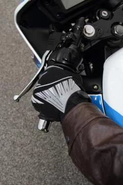 Hand and handlebar Stock Photos