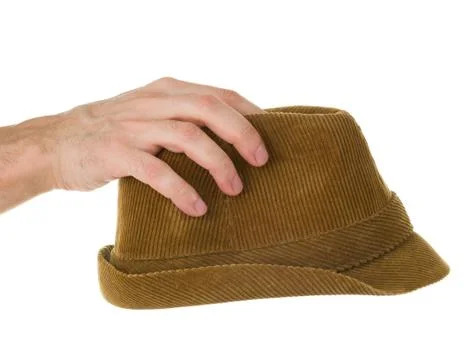 Hand and hat Stock Photos