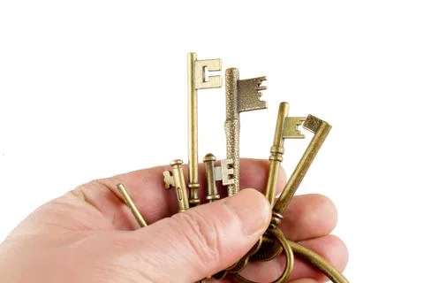 Hand and keys Stock Photos