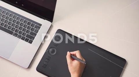 Hand and laptop computer. and mouse pad.On white background. Stock Photos