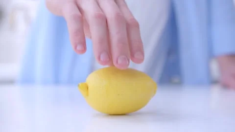 Hand and lemon Stock Footage 134232149