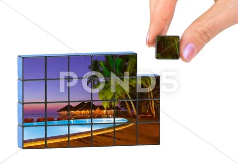 Hand and Maldives puzzle (my photo) Stock Photos