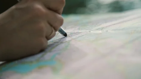 Hand and map2 Video stock 129807841