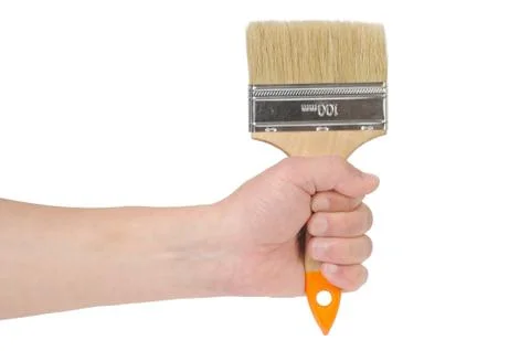 Hand and paintbrush Stock Photos