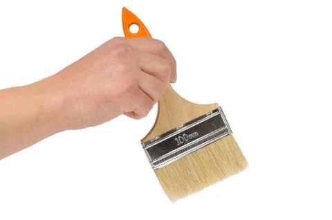 Hand and paintbrush Stock Photos