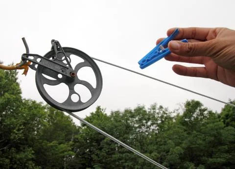 Hand and peg Foto stock