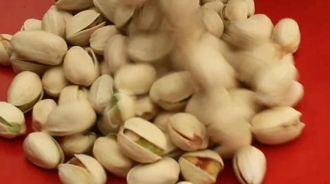 Hand and pistachios Stock Footage 51250339