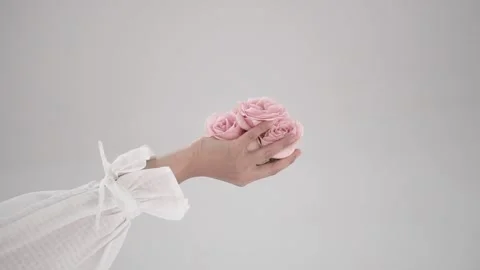Hand and roses Stock Footage 140896825