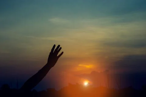 Hand and shadow in the corner. sunset And there is show of love.  silhouette  스톡 사진