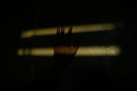 Hand and shadow Stock Photos