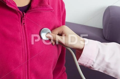 Hand and stethoscope Stock Photos