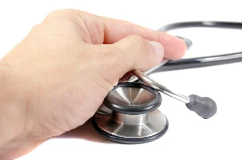 Hand and stethoscope Stock Photos