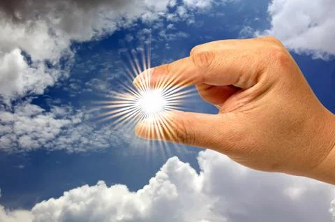 Hand and the sun Stock Photos