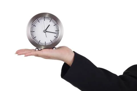Hand and table clock Stock Photos