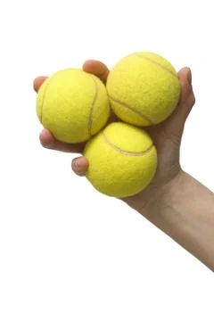Hand and tennis balls Stock Photos