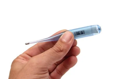 Hand and thermometer Stock Photos