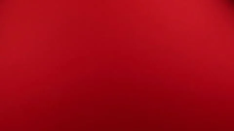Hand appears from below and shows OK gesture on red background, concept of posit Stock Footage 148344385