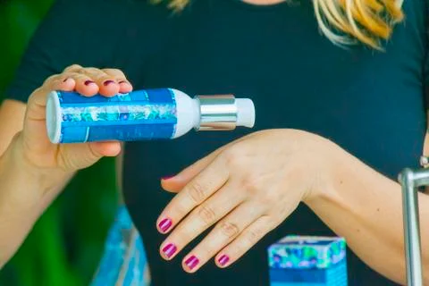 Hand applying cream Stock Photos