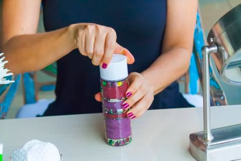 Hand applying cream Stock Photos