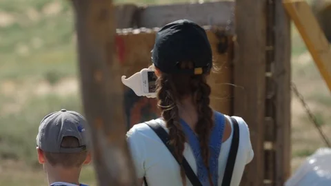 Hand of the archer pulls the bowstrings on the bow slow motion footage Stock Footage 100178840