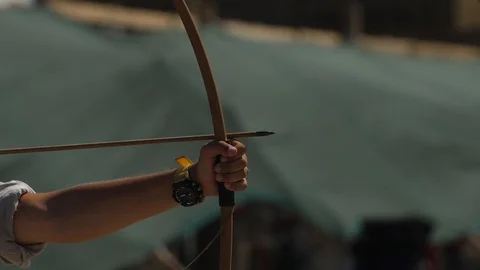 Hand of the archer pulls the bowstrings on the bow 스톡 동영상 100180212