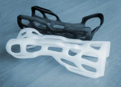 Hand arm splint corset prosthesis langet printed 3D printer from molten plastic Stock Photos