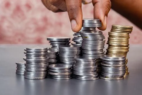 Hand Arrang Stack of Coins Stock Photos