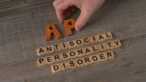 A hand arranging the abbreviation APD: Antisocial Personality Disorder. 스톡 동영상 332849918