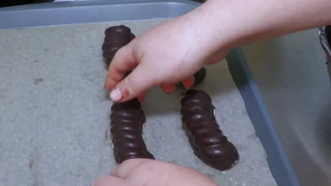 Hand Arranging Chocolate Confectionery During Production Video stock 345045265