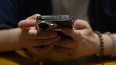 Hand of asian girl using testing phone, close up of hands. Mobile testing, on Stock Footage 318051369