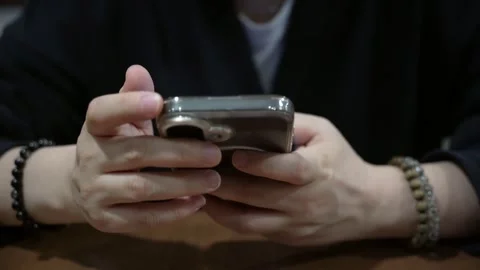 Hand of asian girl using testing phone, close up of hands. Mobile testing, on Stock Footage 333818698