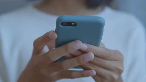 Hand of Asian girl using texting mobile phone or chat. Close up of woman hand Stock Footage 137551376