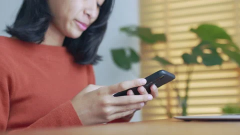 Hand of Asian girl using texting smartphone or chat. Stock Footage 158483979