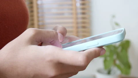 Hand of Asian girl using texting mobile phone or chat Stock Footage 164459974