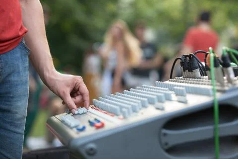 Hand on an audio mixer Stock Photos