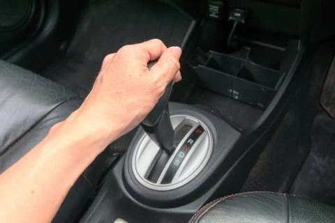 Hand on automatic gear shift Stock Photos