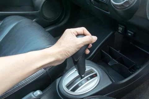 Hand on automatic gear shift Stock Photos