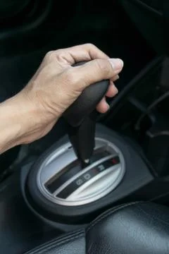 Hand on automatic gear shift Stock Photos