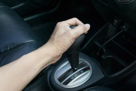 Hand on automatic gear shift Stock Photos