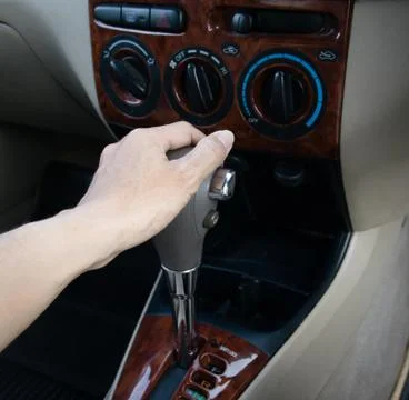 Hand on automatic gear shift Foto stock