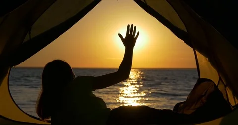 Hand on the background of the sun Video stock 83575967