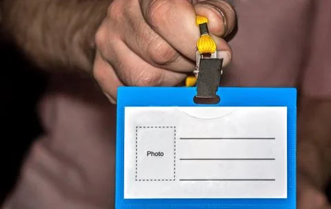 Hand with badge Stock Photos
