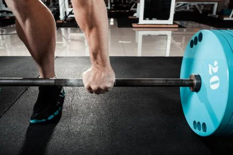 Hand on the barbell Stock Photos