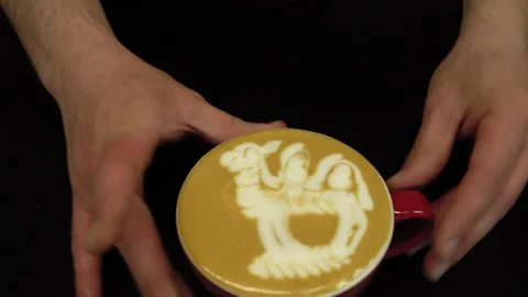 Hand of barista making latte or cappuccino coffee pouring milk making latte art Stock Footage 155491050